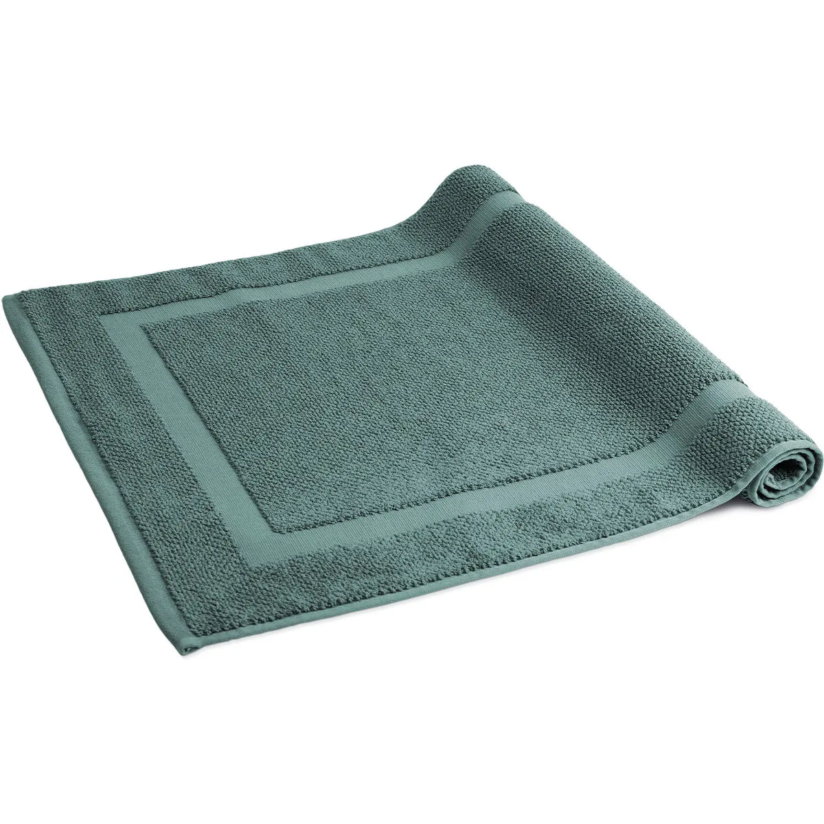 Spa Badvorleger Grün – halb aufgerollte Ansicht von schräg oben, edle Perl-Struktur mit umlaufender Frottier-Bordüre, weich und saugstark, 50x80 cm