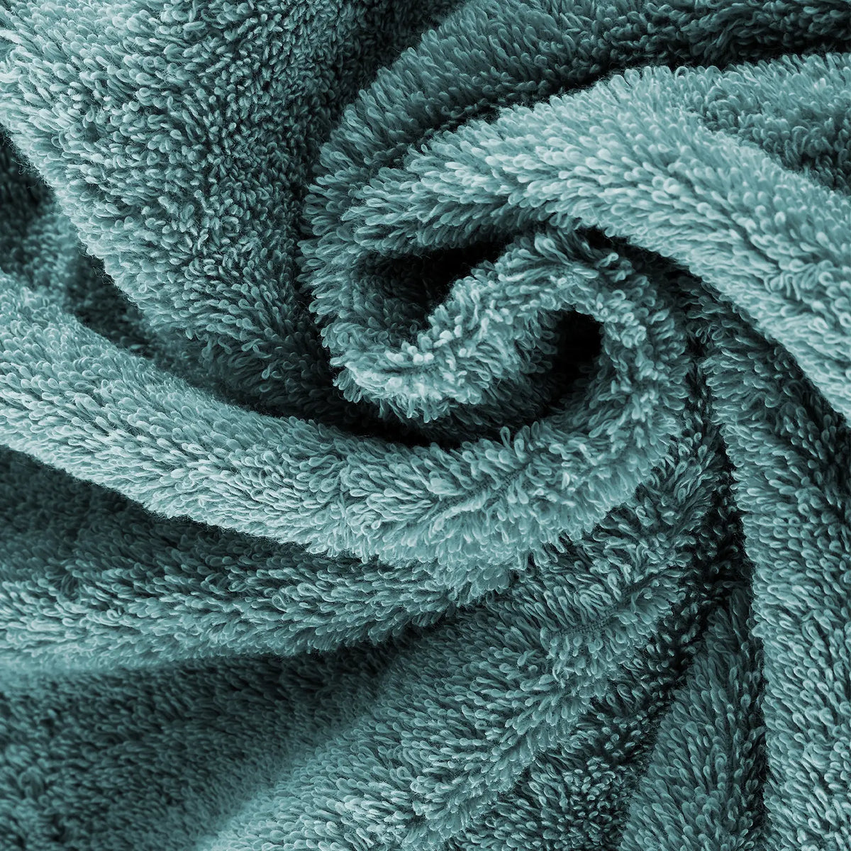 Pura Seiftuch Ozeangrün – Nahaufnahme der dichten Frottier-Schlaufen in gedrehter Spiralform, besonders weiche und voluminöse Textur